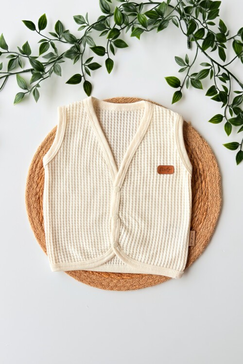 0-9 AY WAFFLE DESENLİ YELEK EKRU